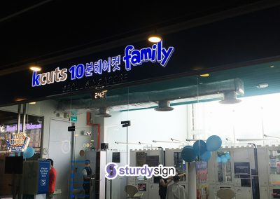 Kcuts-downtown east lightbox signage contractor